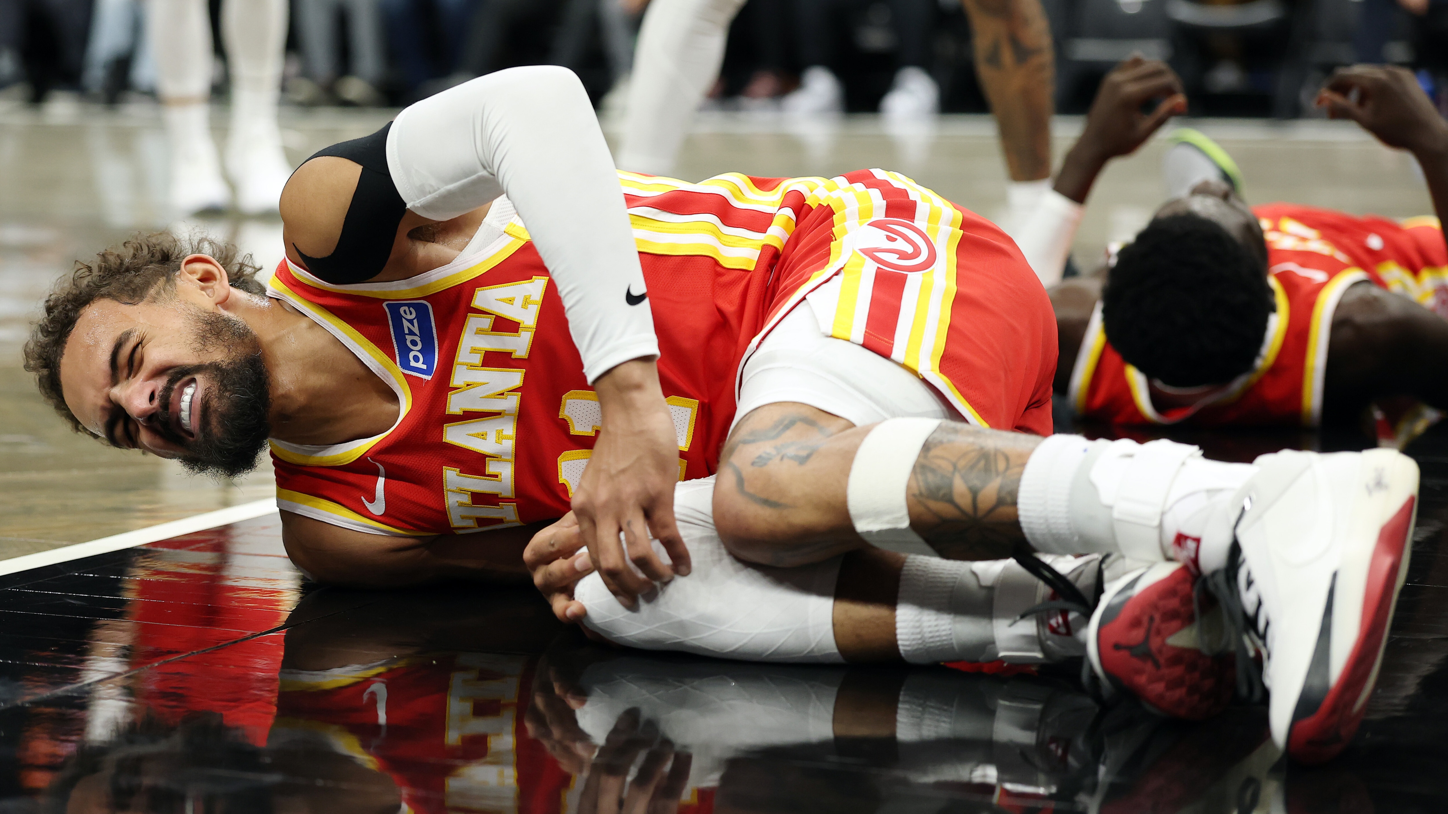 Trae Young Sidelined 4 Weeks With Knee Injury